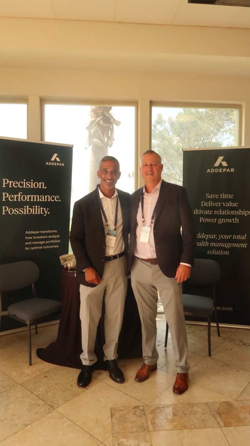 Addepar representatives at the Deals and Dealmakers Summit exhibit
